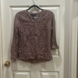 V-neck, cute design on top, size S but fits M as well